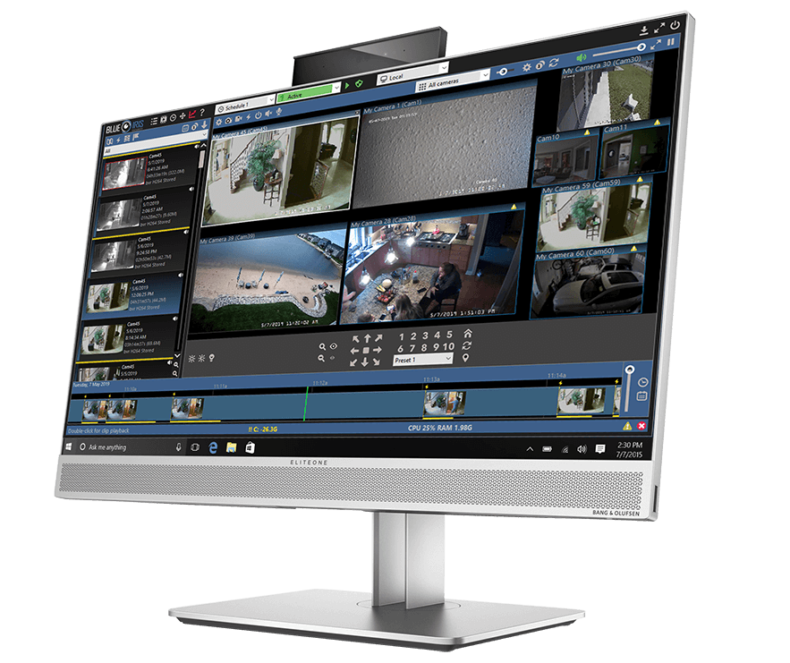Imagem de um monitor e na tela aparece um sistema de monitoramento de cameras